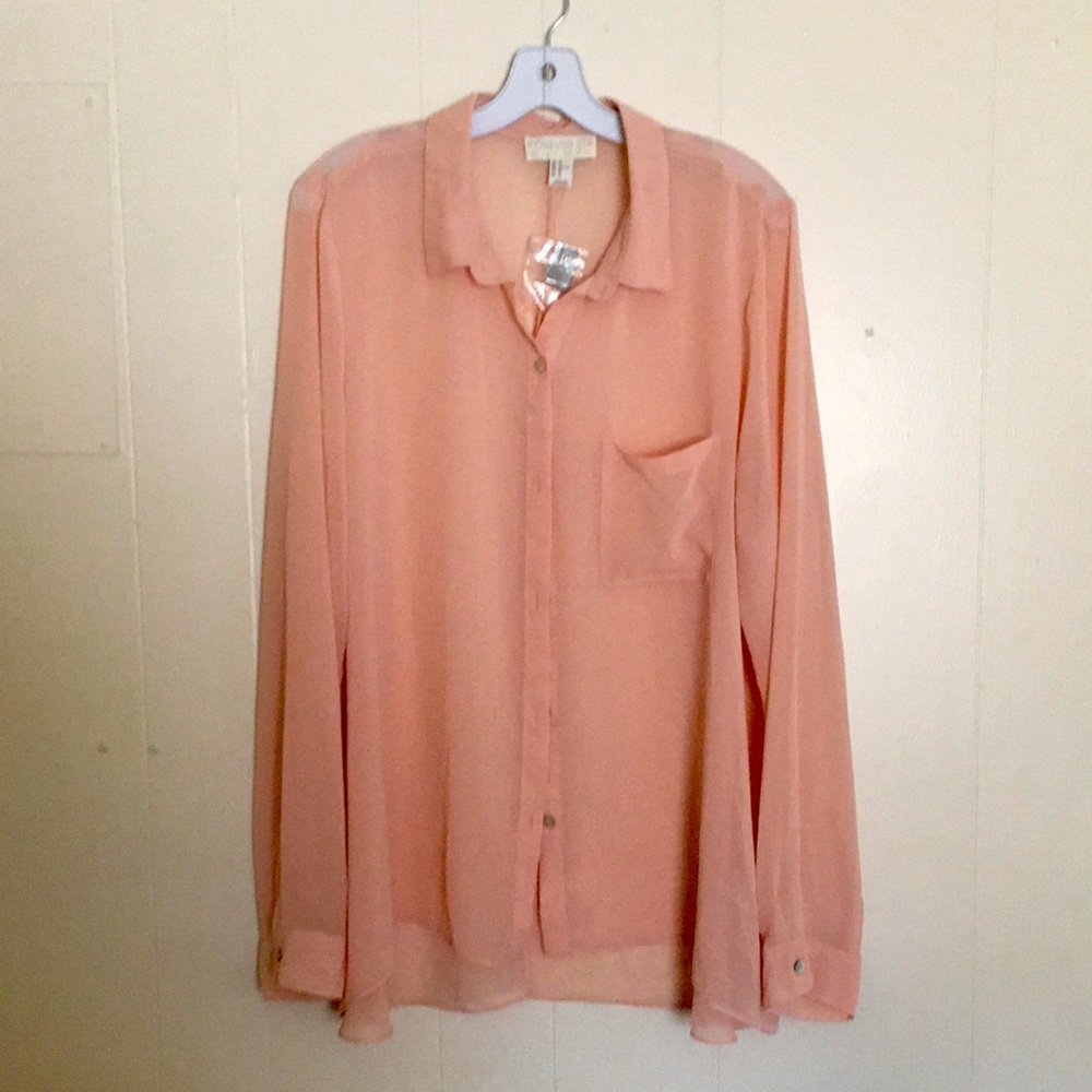 This is a brand new (see-through) blouse.